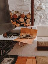 Leñero - Isist, en ambiente junto a la leña - Isist Atelier