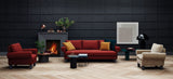Salón con sofá y butacas Magnus de Joquer con base suspendida y patas de madera.